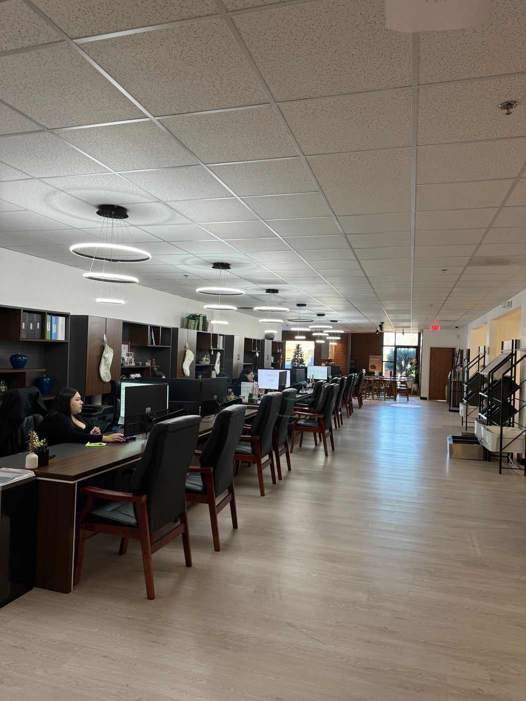 Interior of the L&C Cabinetry Charlotte warehouse showroom with cabinet displays and design stations