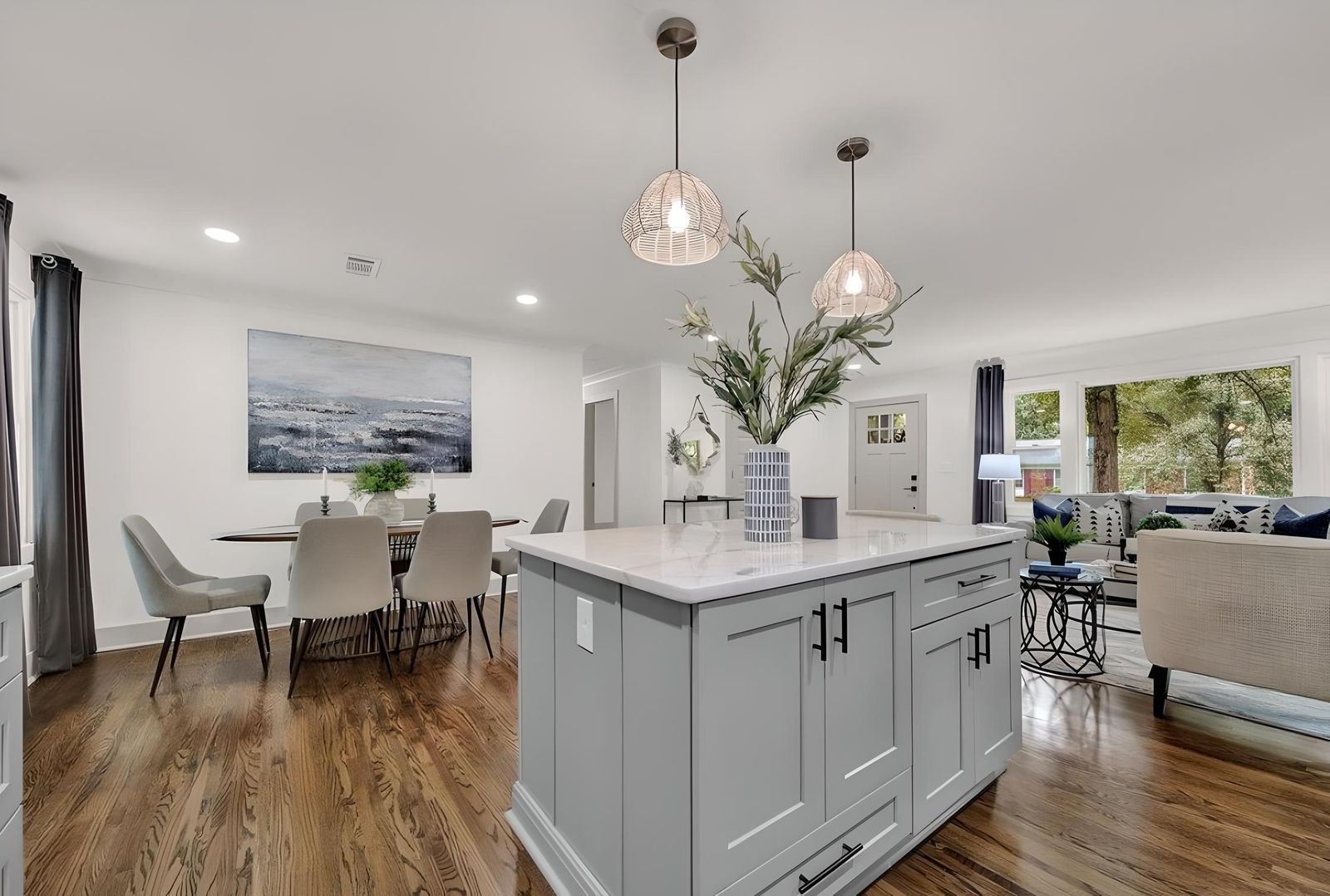 Kitchen with D6 Dove Grey shaker island, white perimeter and glass pendants