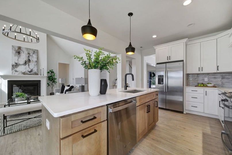 Kitchen with S1 Ash Grey shaker cabinets, white uppers and quartz island