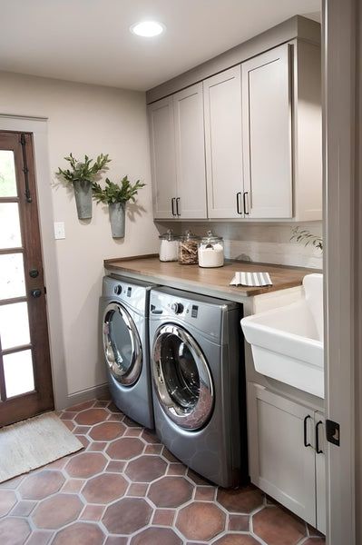 Laundry room with D6 Dove Grey shaker cabinets, farmhouse sink and terracotta tile floor