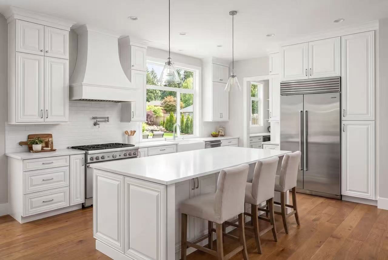 Bright white D-Series kitchen with a large island
