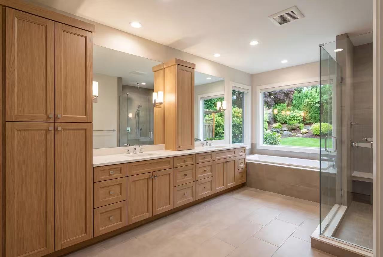 Bathroom with G3 Desert Oak vanity and tall cabinets